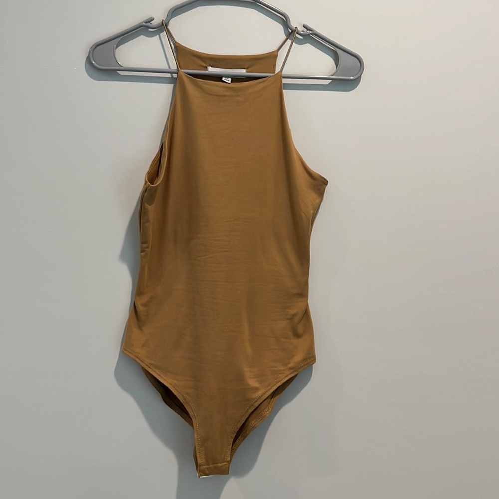 Cute tan xsmall body suit!